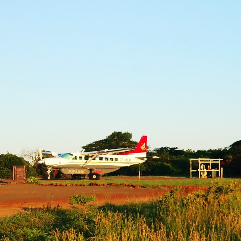 Airlink's Cessna 208 Caravan parked in Phinda Game Reserve