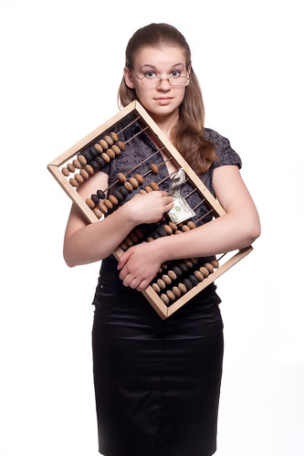 Girl with big wooden accounts and money | by Adisapower