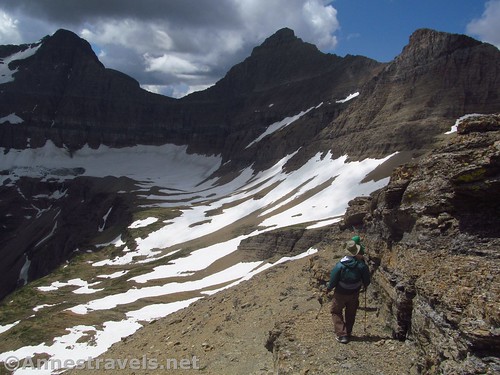 Hiking back down the ridgeline toward Siyeh Pass, Glacier National Park, Montana
