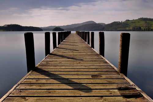 one minute long exposure le vanishing point parkamoor jetty coniston riggwood wooden posts wood boardwalk eastshore lake cumbria lakedistrict lakeland nationalpark nationaltrust fell fells cumbrian mountains landscape imagestwiston conistone countryside mountain water lakes ultrawide wideangle tranquil serene unesco worldheritagesite longexposure nisi nisifilters gnd neutraldensity grad 10stopnd stop nd