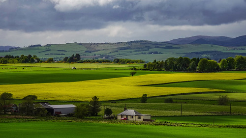 blackisle highlands scotland hills mountains shower rain trees farms rural countryside sky clouds landscape view weather light shadows
