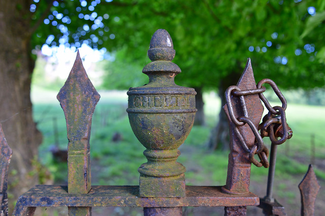 Cast iron metalwork on a gate leading to Leckhampton Court