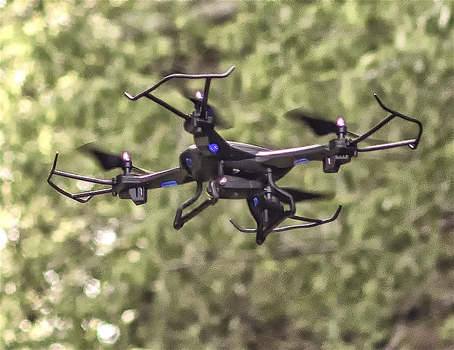 Toy Drone in Flight
