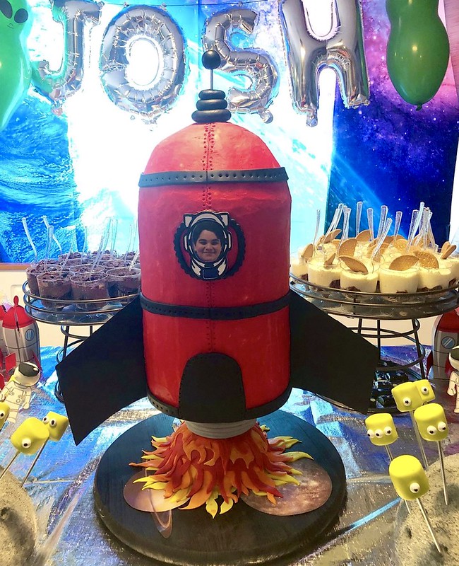 Landing on My 12th Year. This is a cake i made for my baby brothers birthday, his dream is to become an astronaut and fly into space. By Cassandra Salas of Cassy's Cakes