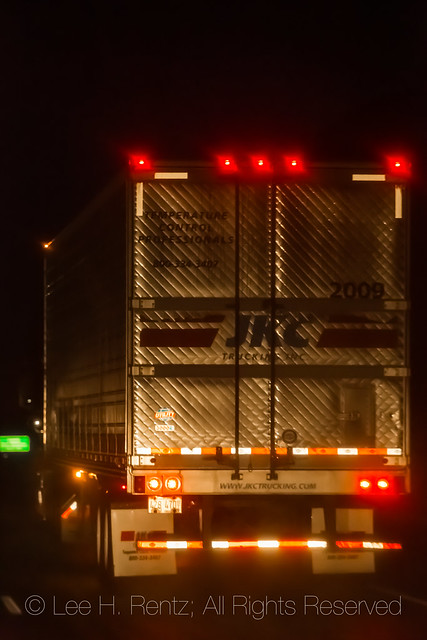 Semi on a Wet Road at Night