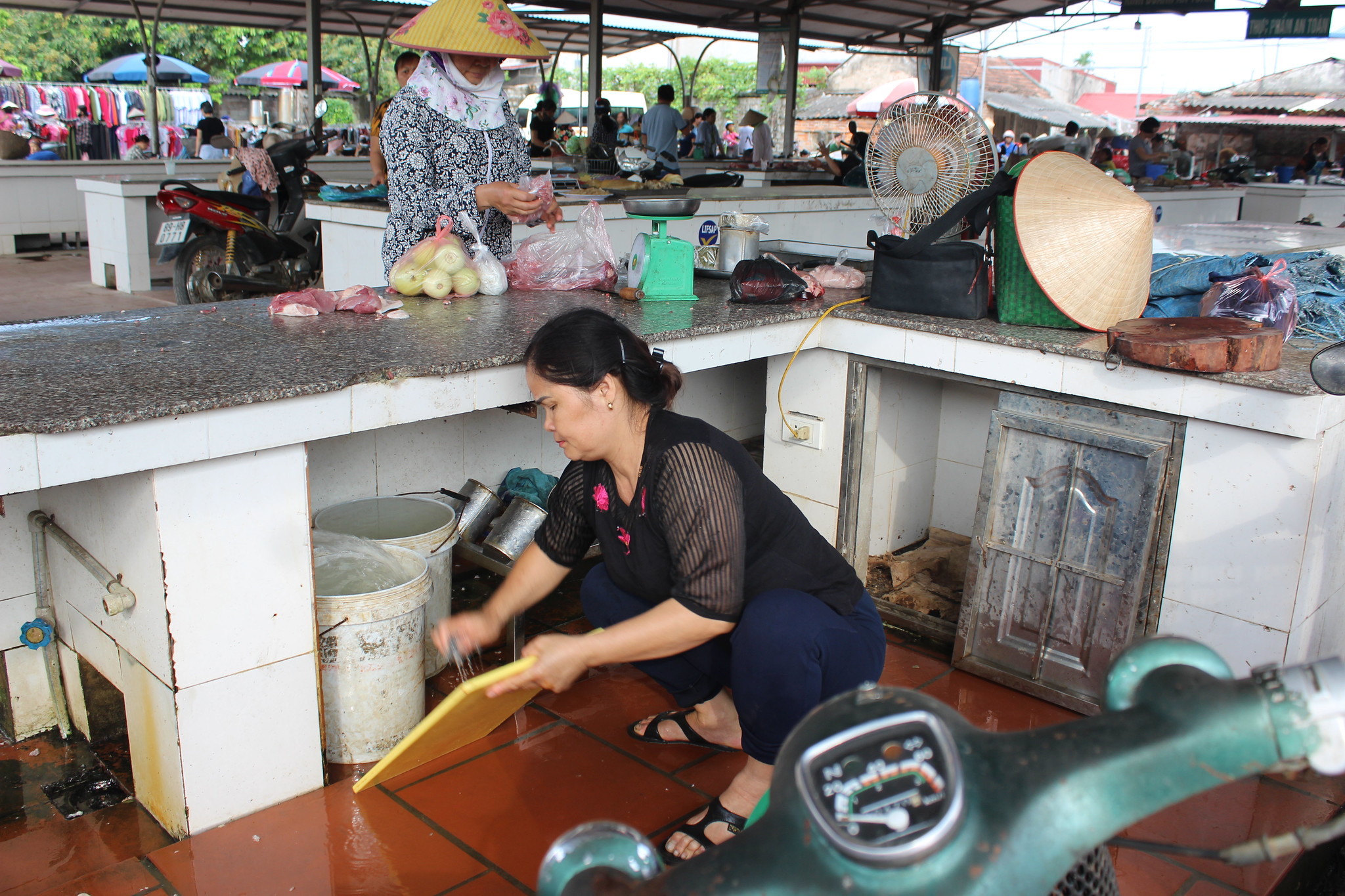 Pork retailer in a wet market in Hung Yen Province, Vietnam