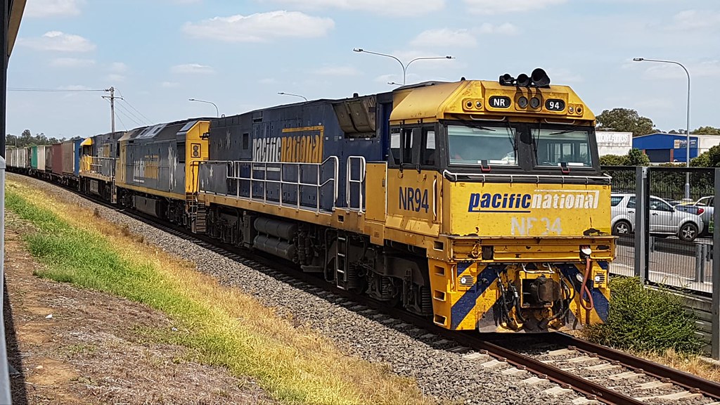 NR94 leads an AN/NR on an up intermodal at Leumeah NSW