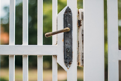Close-up of a vintage door lock on a fence gate | by Ivan Radic