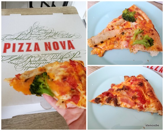 Pizza Nova pizza in hand