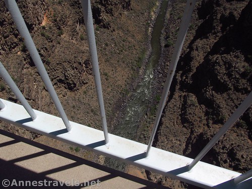 Looking down through the railing on the Rio Grande Gorge Bridge, Rio Grande del Norte National Monument, New Mexico