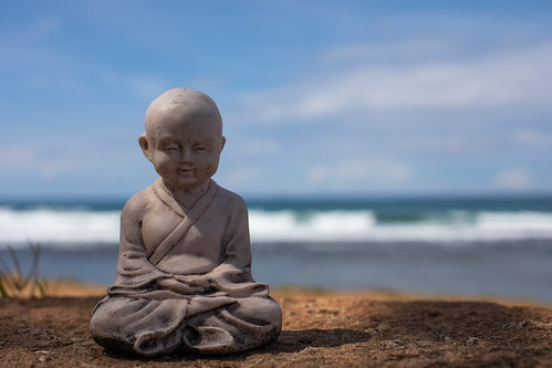 religion calm zen trinket asia carving stone amomentofpeaceontheseawallabovetheindianoceaningalle srilanka canon landscape depthoffield image gettyimages gettylandscapes gettysrilanka wall onthewall bythesea indianocean waves holiday tourism luck love geraintrowlandtravelphotography