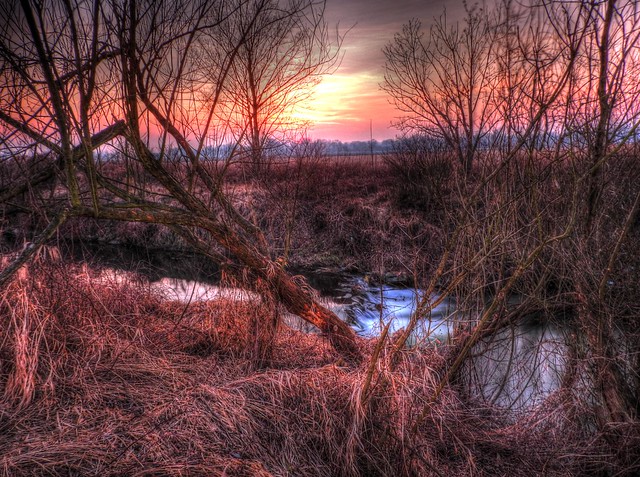 Sunset over winter creek