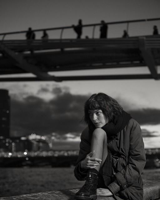 Sara, pensive under the Millennium Bridge.