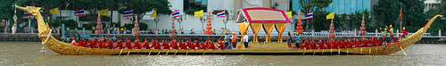 Boatmen, in traditional costume, rowing the King's Barges (long boats) in a rehearsal of the processions in Bangkok, Thailand