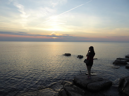 sunset evening lake huron kettlepoint ontario peaceful water sky twilight woman photographing photographer