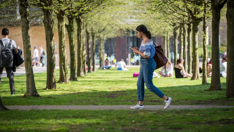 A student walking through campus