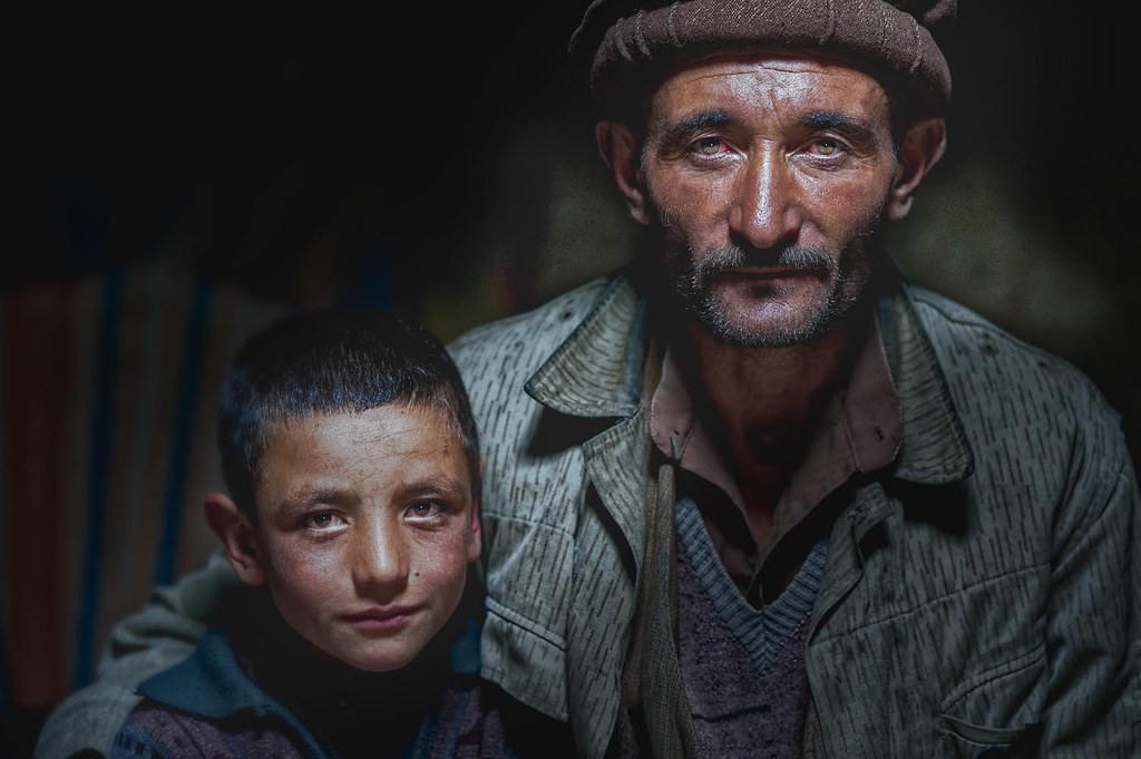 Wakhan Corridor, Afghanistan. Wakhi father and son.