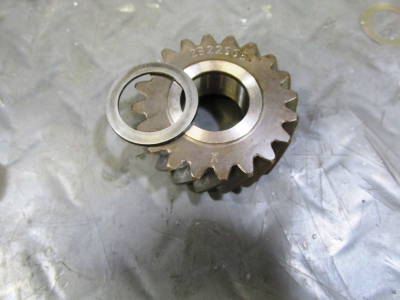 New Output Shaft "Tall" 5th Gear & Original Washer Which Goes On The Other Face Of The Gear (Note "X" at Bottom Of New 5th Gear Indicating It Has A 17.5 Degree Helix)