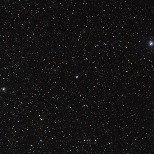 The Ring Nebula (Messier 57) in the middle of the stars Beta (right) and Gamma (left) Lyrae