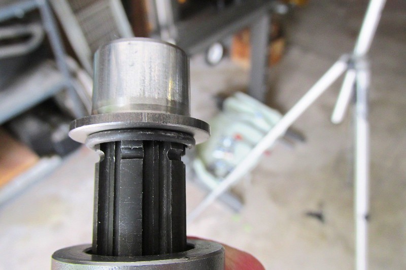 Input Shaft Spring Collar Snap Ring Pushed Past Groove At Top Of The Shaft Against The Shoulder Of the Top Hat