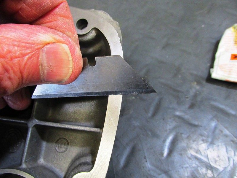 Use Box Cutter Blade To Level Wet JB Weld And Remove Excess