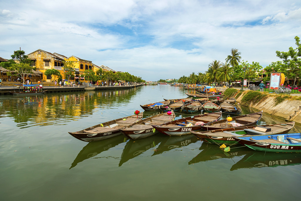 View of boats on busy river in Hoi An, Vietnam. Hoi An is the World's Cultural heritage site.