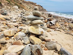 Rock Piles On The Beach