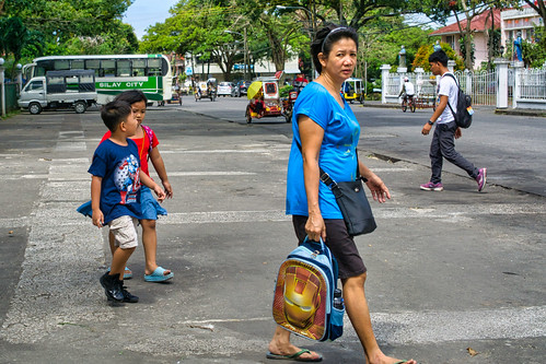 street people woman children walking city philippines asia sony silay