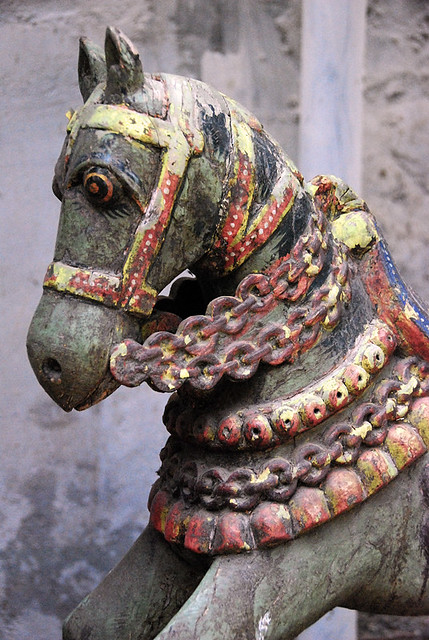 Painted wooden antique rocking horse in Udaipur, India