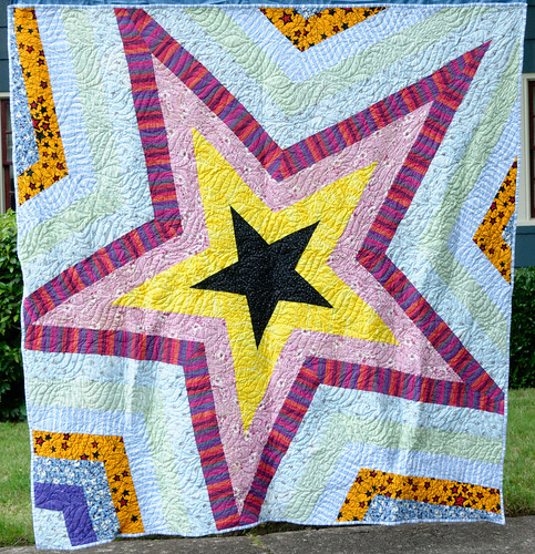 The second of the two Star Storm quilts made from hospital gowns and other memories.