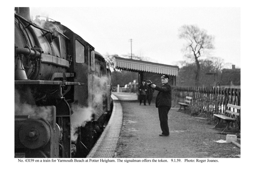 Potter Heigham. Signalman and 43159 with train for Yarmouth Beach. 9.1.59