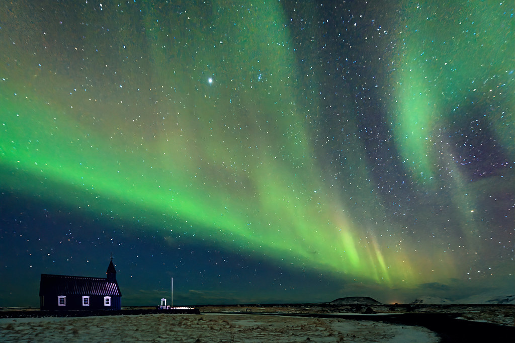 Northern Lights over famous Black church at Budir on the Snæfellsnes peninsula, Iceland