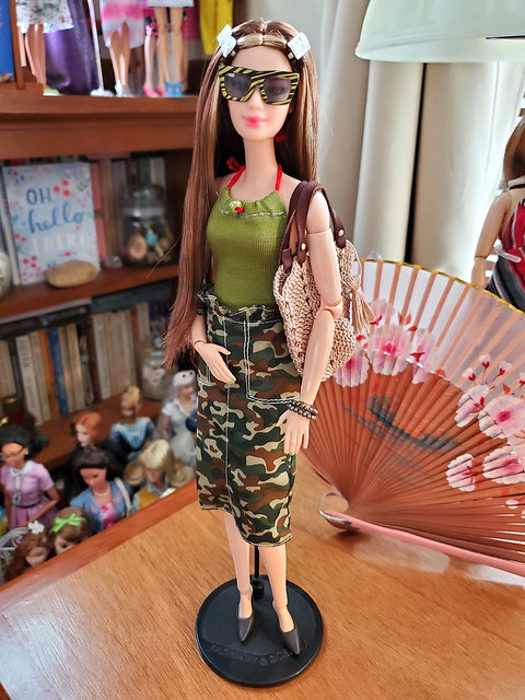 Long, tall Sally in a new fashion pack skirt, which the sunglasses came with as well.  The top was made by an Etsy artist who is gone, unfortunately.  Sally's wearing Susie pumps, because tall girls often wear heels!  :>)
