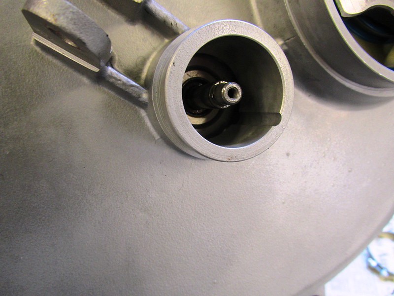 Clutch Throw-Out Rod Installed At Rear Of Transmission In Hole That Holds Combination Piston-Bearing and Return Spring