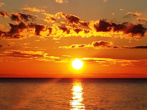 Grab Your Shades by Kakki17, michigan sky sun sunset cloud water lake superior orange nature outside outdoor landscape reflection