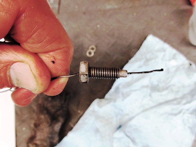 Use Wire To Ensure Breather Bolt Hole Is Clear
