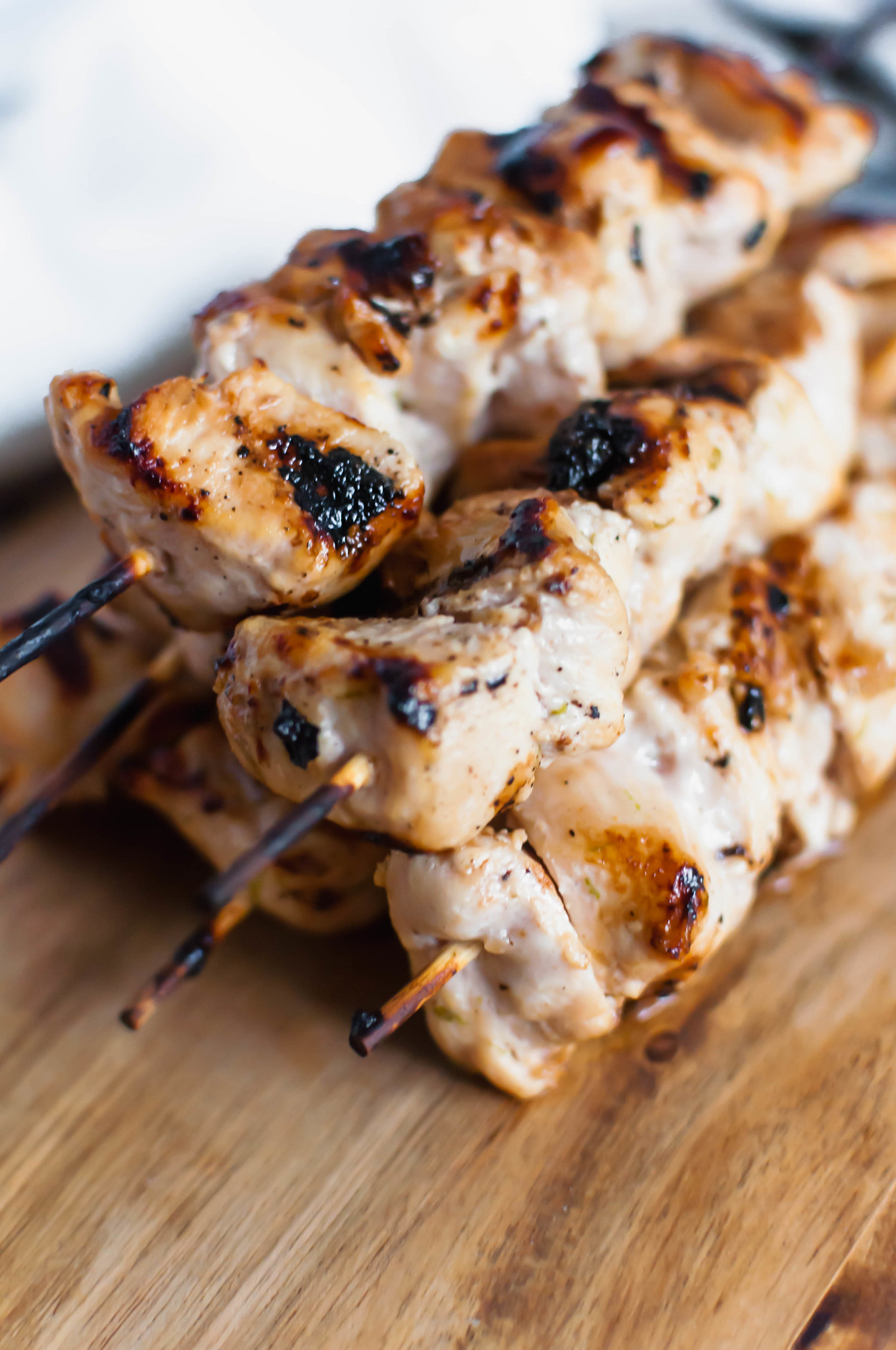 Need some tropical vibes in your life?! This Grilled Coconut Chicken will transport your mind to the beach. Simple, healthy and packed with coconut flavor. A super easy summer meal!