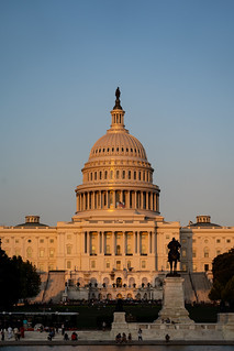United States Capitol building at dusk sunset during a summer day, glowing from sunshine. Portrait orientation