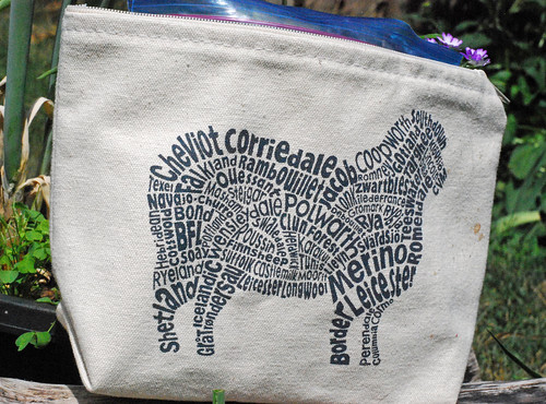 Cotton small zippered print Ravelry.com pouch with names of sheep breeds arranged to form a sheep-shaped image.