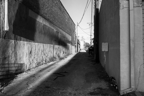 rural smalltown texas sunset light shadows blackandwhite bw blackandwhitephotography alley alleyway lumixlx100