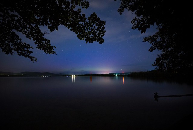 Shy aurora on the lake, Québec