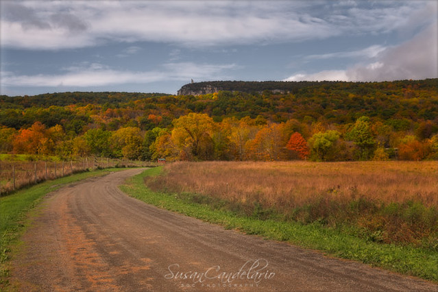 Shawangunk Mountain Hudson Valley NYShawangunk Mountain Hudson Valley NY  -  Paltz Point view from east, with the warm and bright colors of peak fall foliage. The Shawangunk Ridge, also known as the Shawangunk Mountains or The Gunks, can also be seen in t