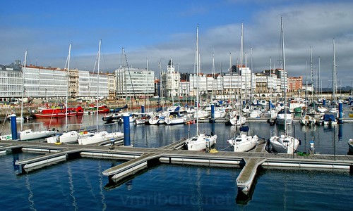 acoruña esp espanha galicia geo:lat=4336908901 geo:lon=839831371 geotagged colourful land vehicle panorama place sunrise working commercial calm recreational break frame people resort sailing sport sail maritime balcony tourist nautical vessel la yacht cruise white young urban dock jetty red harbor leisure marina docked blue holiday destination port europa facades pier moored vacation quayside water construction sea boat corunha sony 350