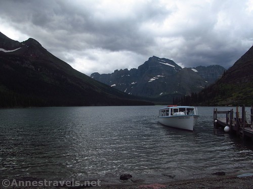 The tour boat disembarks from the dock at the foot of Lake Josephine, Glacier National Park, Montana