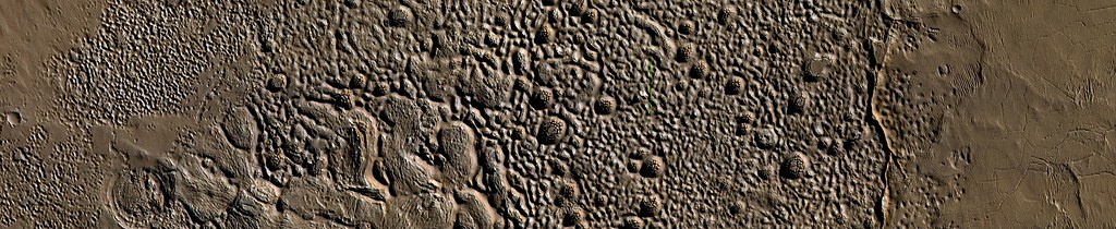 Mars - Dark Butte Capping Material in Mid-Latitude Crater Floor