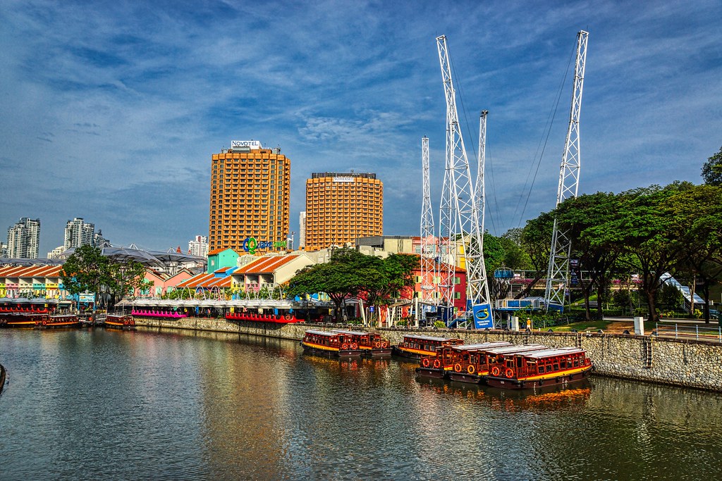 Clarke Quay with tourist bum boats on the Singapore River