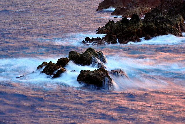 Sea rocks and waves at Sunset