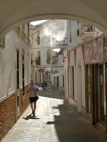spain extremadura zafra alley arch heat shop terrace old view town water mist