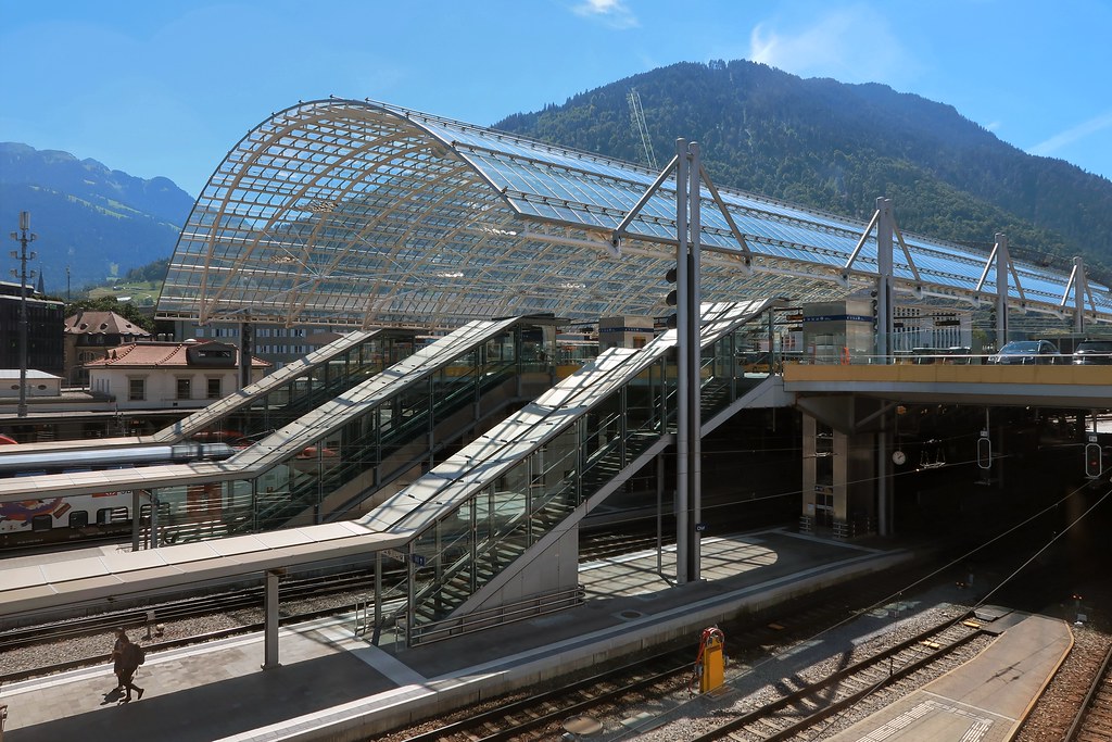 Chur Station with a big glass roof and platforms on display