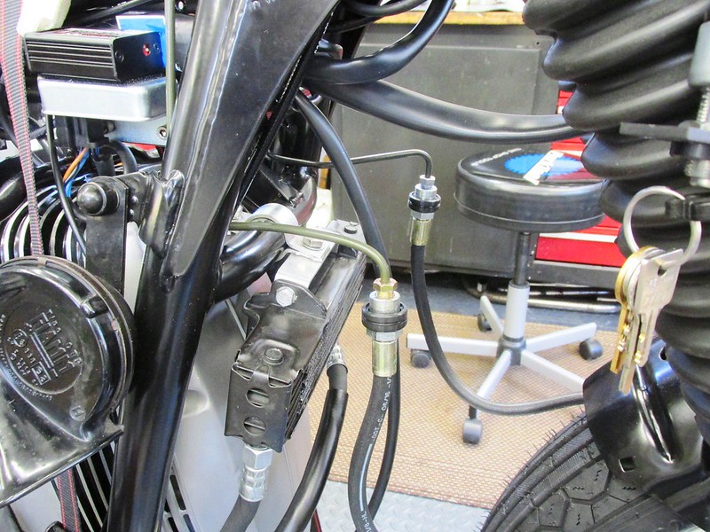 Front Brake Manifold Steel Lines Connected To Caliper Brake Hoses